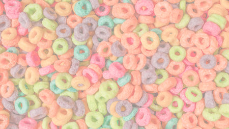 Sweet multicolored flakes, cereal loops as a background ..