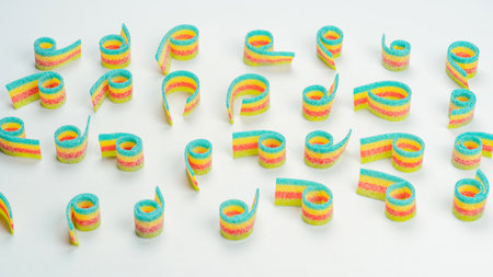 Assorted colorful gummy candies. top view. Jelly donuts. Jelly bears. isolated on a white...