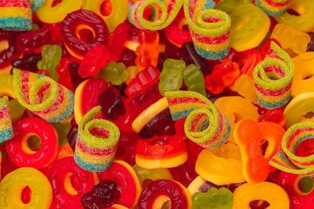 Assorted colorful gummy candies. top view. Jelly donuts. Jelly bears.の写真素材