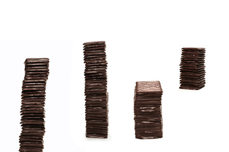 Dark chocolate candies isolated on a white background.の写真素材