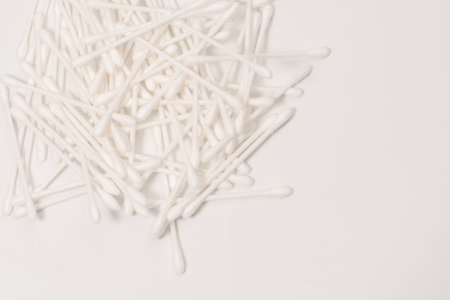 Group of white cotton buds isolated on a white background.