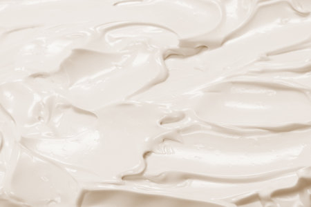 White whipped cream texture. Top view.
