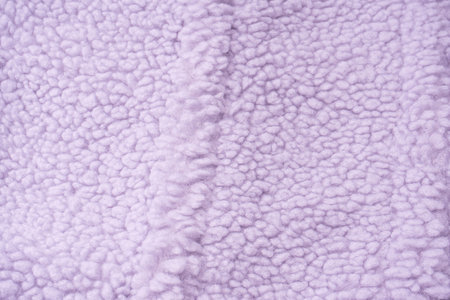 Purple fur texture as a background. top view.