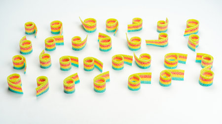 Assorted colorful gummy candies. top view. Jelly donuts. Jelly bears. isolated on a white background.の写真素材