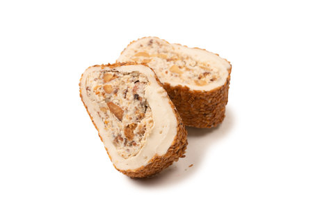 Sweet roll with nuts, turkish sweets. Turkish rahat isolated on a white background.の写真素材