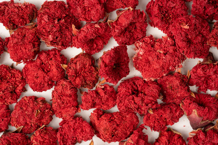 Dried pomegranate flower as a background. top view.