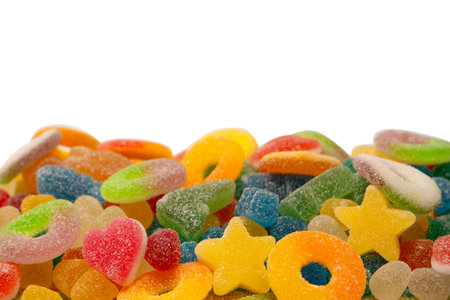 Assorted gummy candies isolated on a white background. top view. Jelly sweets.