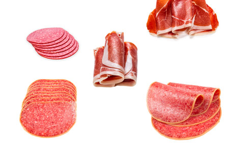 Tasty salami slices isolated on white background.