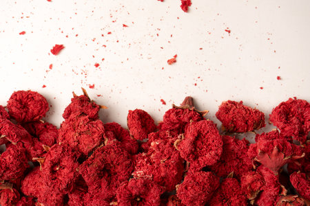Dried pomegranate flower isolated on a white background. top view.の写真素材
