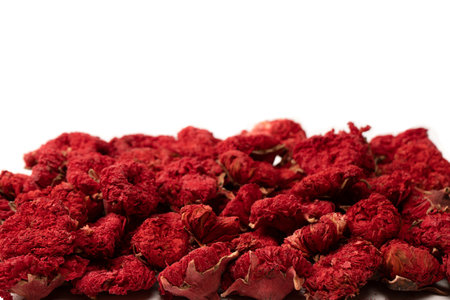 Dried pomegranate flower isolated on a white background. top view.