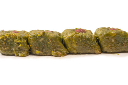 Turkish pistachio baklava isolated on a white background.の写真素材