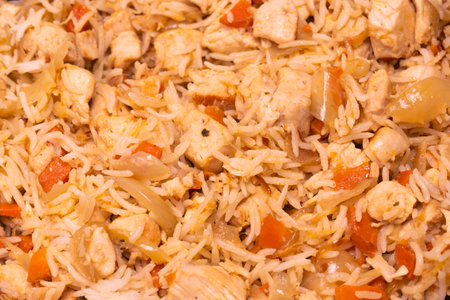 Tasty pilaf with chicken as a background.の写真素材