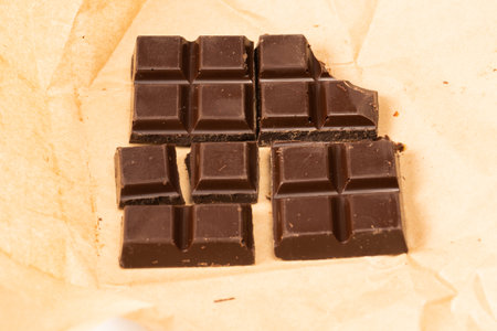 A chocolate bar isolated on a white background.