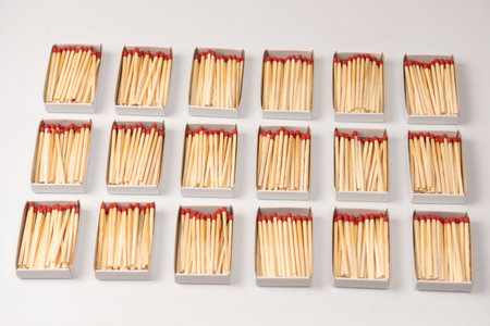 Boxes with new matchsticks as a background. top view.の写真素材