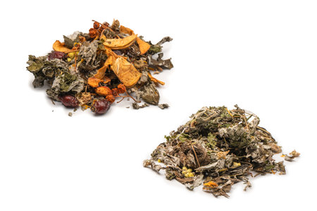 Dry tea leaves and dry fruits isolated on a white background.の写真素材