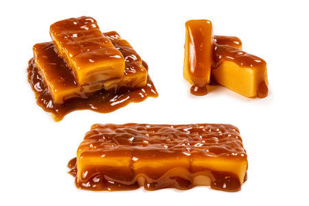 Tasty caramel candy isolated on white background. Copy space.の写真素材