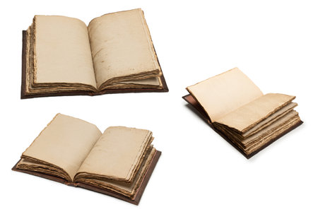 An open empty old notebook isolated on a white background. Copy space.の写真素材