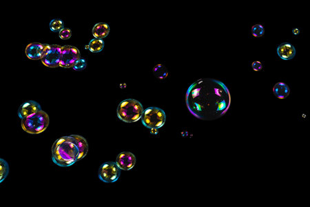 Soap bubbles isolated on a black background. Copy space.の写真素材