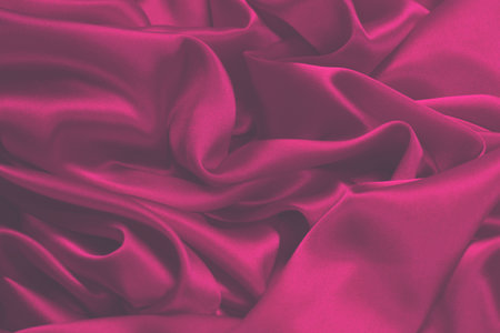 Rich and luxury red silk fabric texture background. Top view.の写真素材