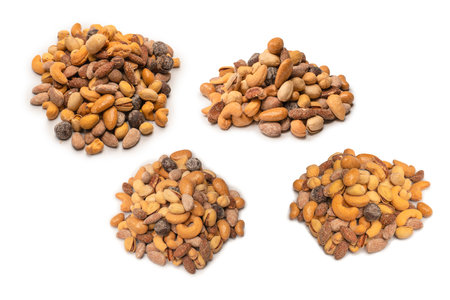 Mix of tasty salty nuts. A group of almonds, pistachios, walnuts, macadamia, cashews.の写真素材