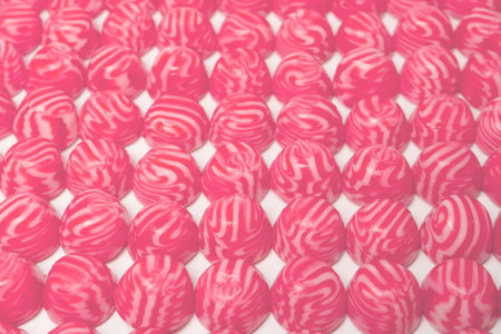 Red round tasty gummy candies as a background. Top view.の写真素材