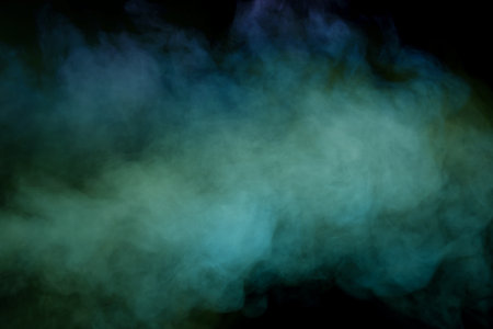 Blue and purple steam on a black background. copyspace.の写真素材