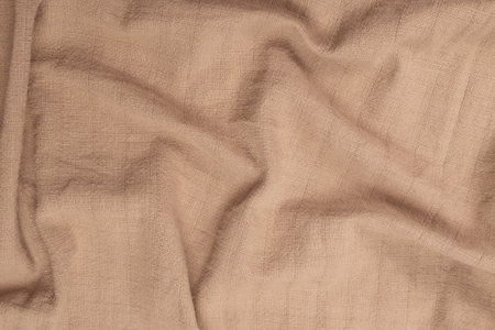 Cotton beige fabric pattern. Top view.の写真素材