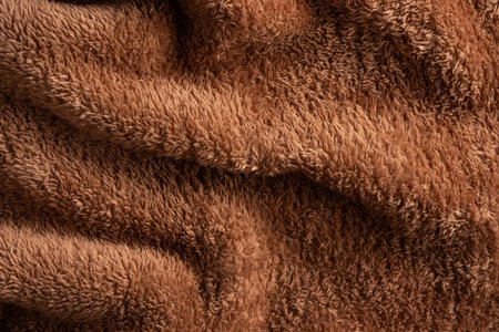 Texture of a brown faux fur as a background.