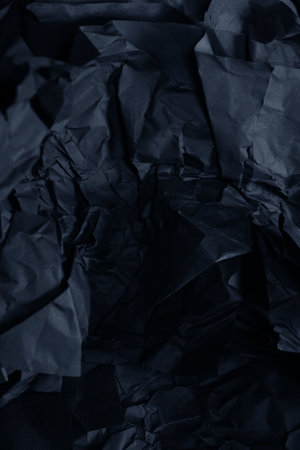Abstract black paper texture background. Top view. Copy space.の写真素材