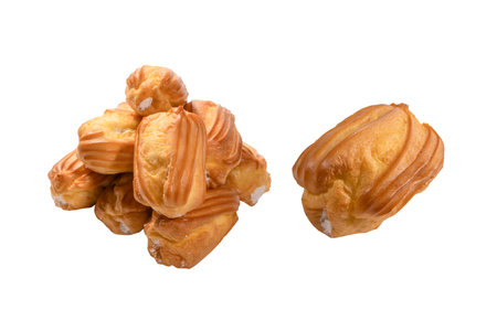 Sweet eclairs isolated on a white background. Top view.