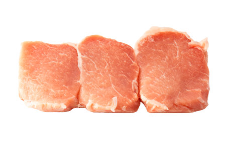 Raw pork pieces isolated on a white background. Top view.の写真素材