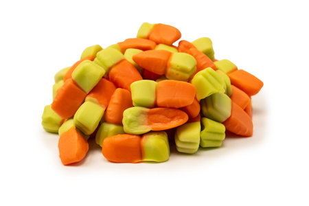 Juicy colorful jelly sweets isolated on white. Gummy candies. Jelly carrots.