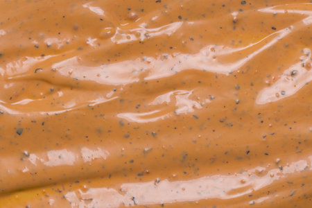 Whipped delicious sauce texture. Hamburger sauce background. Top view.の写真素材