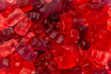 Assorted red gummy candies. Top view. Jelly bears.の写真素材