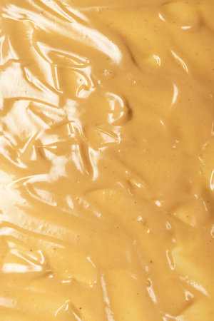 Mushroom sauce as a background. Top view.