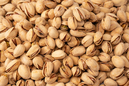 Tasty pistachios isolated on a white background.の写真素材