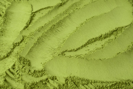 Matcha tea, matcha powder as a background.