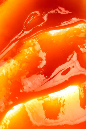 Tasty red sauce splashes as a background.の写真素材
