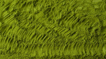 Matcha tea, matcha powder as a background.