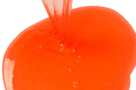 Red slime isolated on a white background. Top view.の写真素材