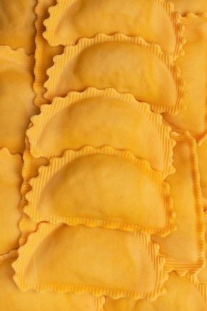 Raw ravioli as a background. Healthy italian food.