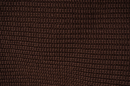 Brown sweater texture as a background. Top view.の写真素材