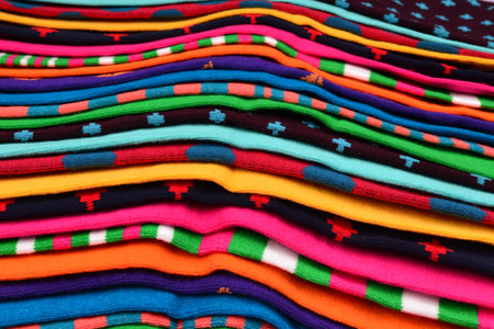 Colorful collection of cotton socks as a background.の写真素材