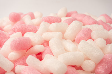 Pink and white box filler as a background. Top view.の写真素材
