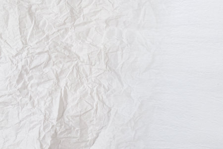 Crumpled white paper background. Top view. Copy space.の写真素材