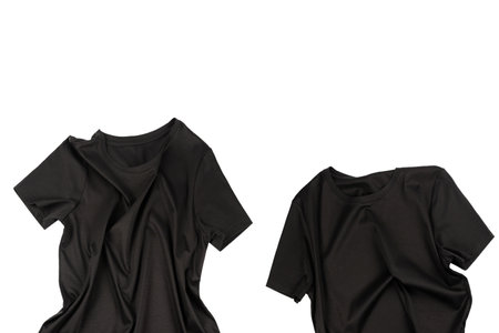 A black cotton t shirt isolated on a white background.の写真素材