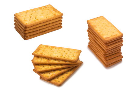 Cracker with salt isolated on white. Top view.の写真素材