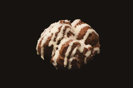 Profiteroles with coconut cream on a black background.の写真素材