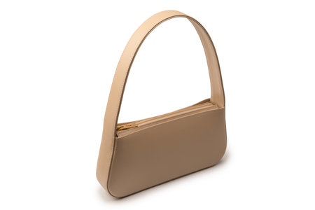 Beige women leather bag isolated on a white background.の写真素材