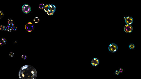 Soap bubbles isolated on a black background. Copy space.